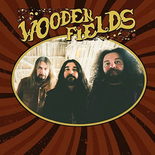 CD cover featuring three long-haired men in an oval frame.