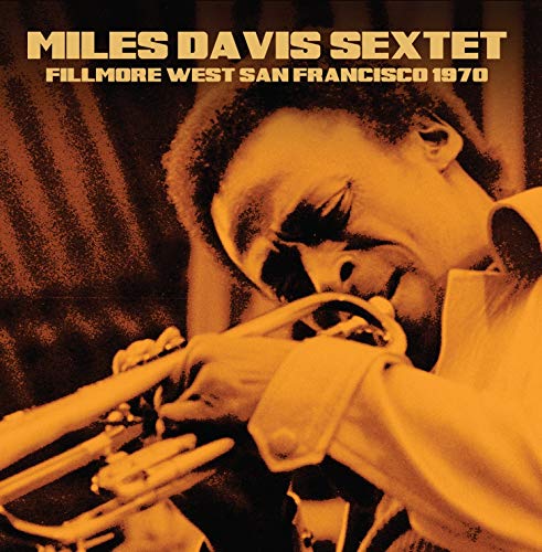 Miles Davis playing trumpet, album cover for "Fillmore West, 1970".