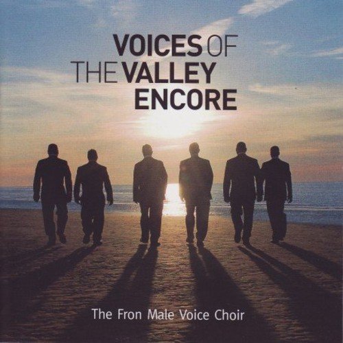 "CD cover featuring silhouettes of men walking on a beach at sunset."
