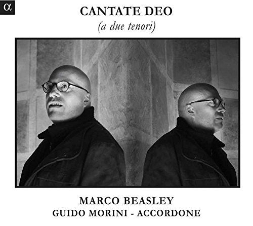 "Album cover with black and white image of two bald men wearing glasses."