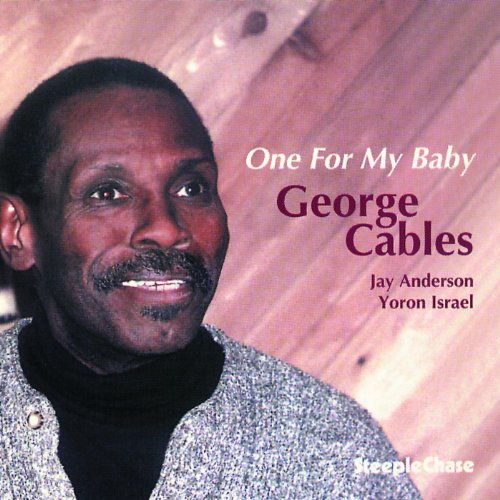 George Cables' album cover: man smiling, wooden background, text "One For My Baby".
