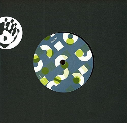 Vinyl record label with abstract geometric shapes in green and blue.