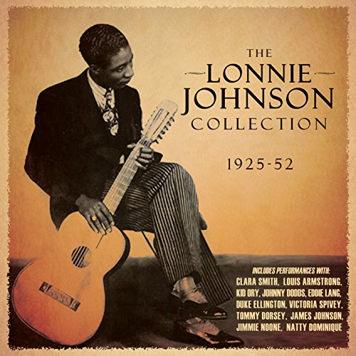 "CD cover featuring a man in a suit holding a guitar, sepia-toned background."