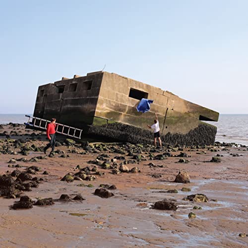 CD cover depicting two figures near a concrete coastal structure.