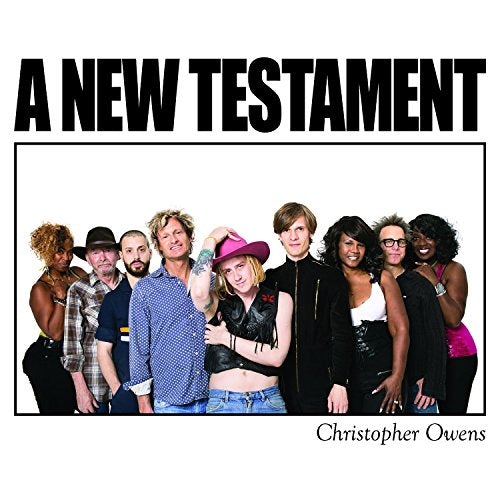"Album cover with 'A New Testament' title and group of people posing together."