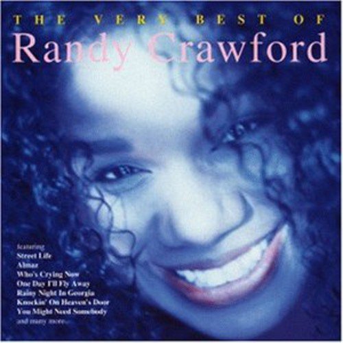 "CD cover with a smiling woman's face and song titles listed."