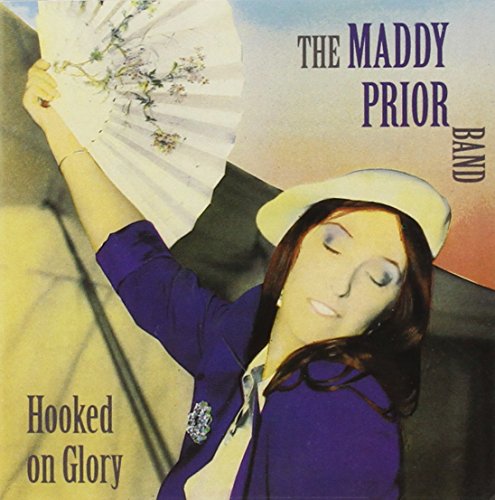 Album cover featuring a woman in a white hat and purple jacket holding a fan.