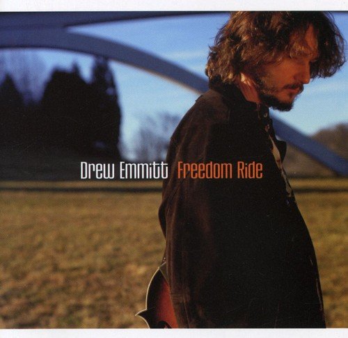 "Drew Emmitt album cover featuring a man in a field with a metal arch."