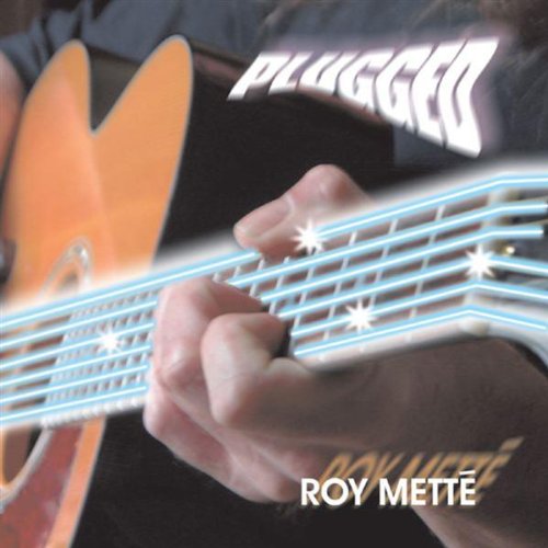 "Album cover with a person playing an electric guitar and 'PLUGGED' text."