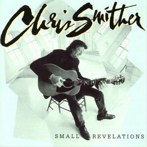 Album cover featuring a man sitting on a stool playing an acoustic guitar.