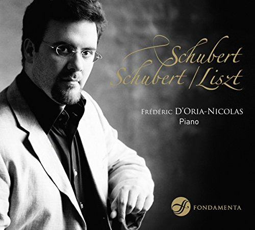 Black and white photo of man on CD cover with gold script and text.