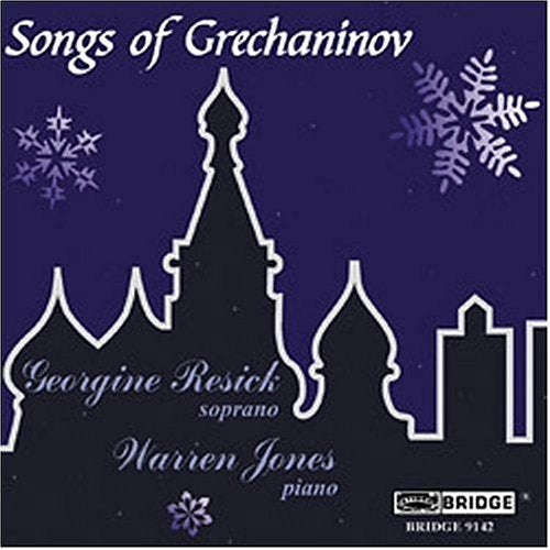 "CD cover with dark blue background, white church silhouette, and snowflakes."