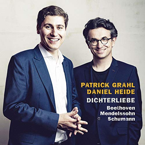 "CD cover featuring two men in suits, smiling, with text overlay."