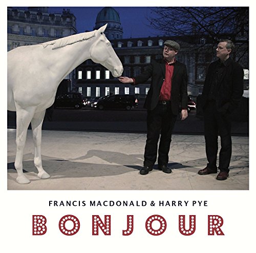 Album cover featuring two men in dark clothing and a white horse.