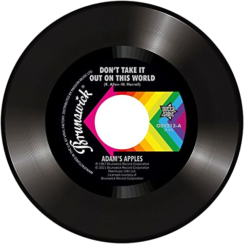 Black vinyl record with colorful center label displaying song titles.