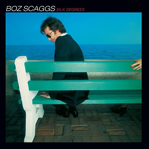 "Album cover of 'Silk Degrees' by Boz Scaggs, featuring a man on a green bench."