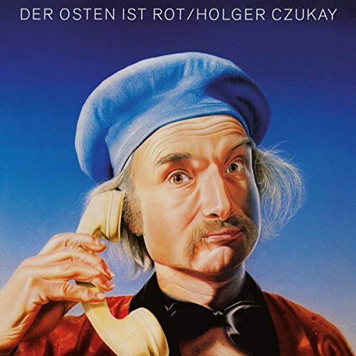 Album cover for Holger Czukay’s “Der Osten Ist Rot” featuring a man with a phone.