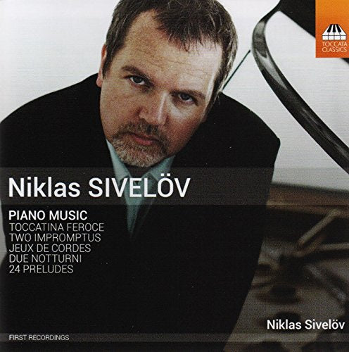 CD cover featuring a man in a suit with piano in the background.