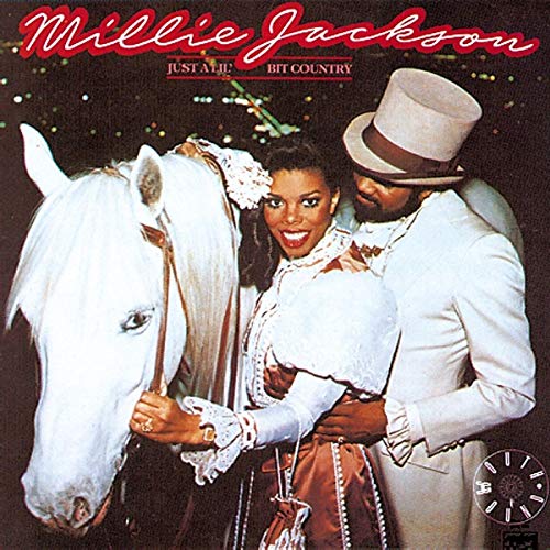 Album cover: Millie Jackson with a man and a white horse.