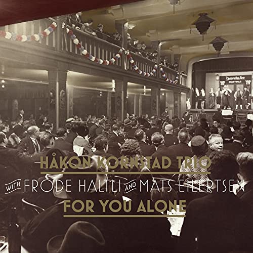 CD cover: vintage theater crowd with band name and album title overlay.
