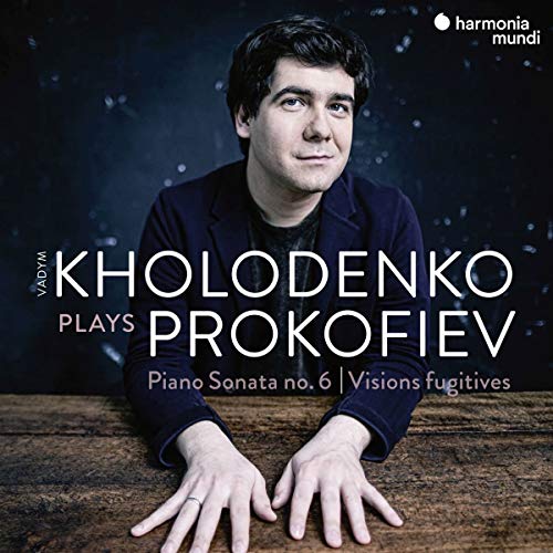 CD cover featuring pianist Vadym Kholodenko, dark background, text overlay.