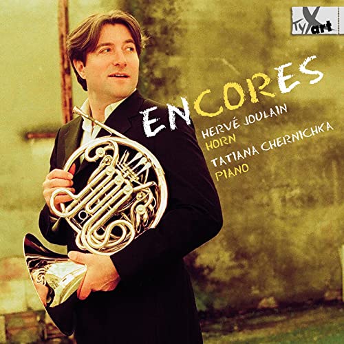 Hervé Joulain holding a French horn, album cover for "Encores" CD.