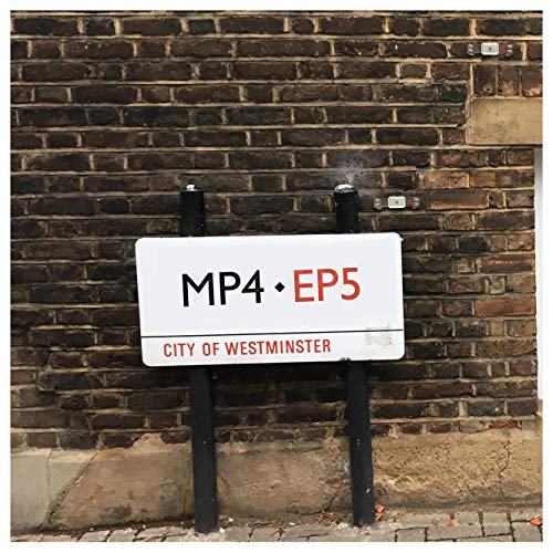 White sign reading "MP4 • EP5" against a brick wall.