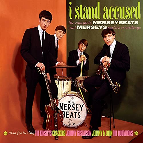 CD cover featuring four young men in suits with musical instruments.