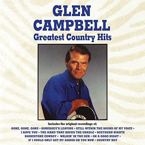 Glen Campbell’s “Greatest Country Hits” vinyl record cover with his portrait.