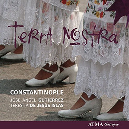 "CD cover featuring women's legs in white lace skirts and white shoes."