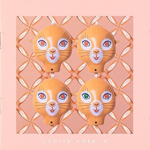 CD cover with four orange cat-head toys against a pink lattice background.