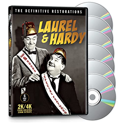 Laurel & Hardy DVD set with four discs and classic image.