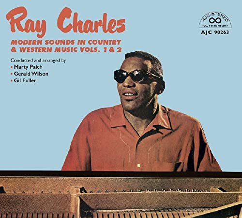 "Album cover featuring Ray Charles at a piano, wearing sunglasses, on a blue background."