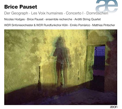 "CD cover featuring a shadowy figure in a dimly lit, textured room."