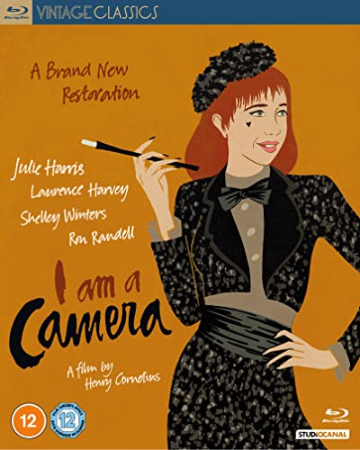 Blu-ray cover featuring an illustrated woman in a black patterned suitSCH suit.H.