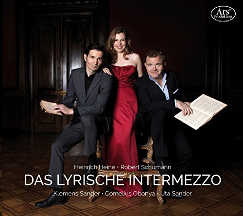 CD cover featuring three formally dressed people, two men and one woman, posing together.