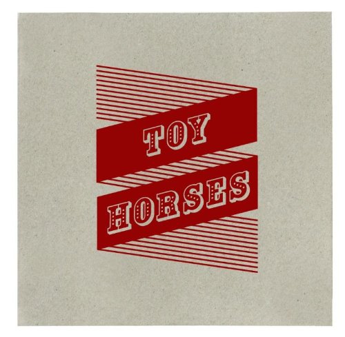 Album cover with "Toy Horses" in white text on red banners, beige background.