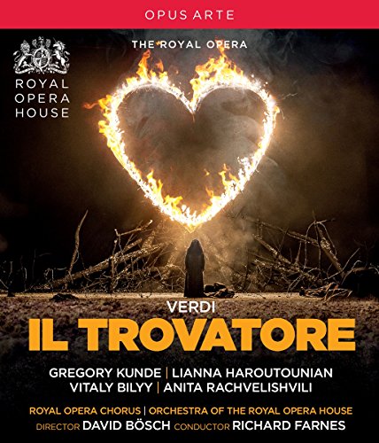 "Blu-ray cover featuring a burning heart-shaped pyre with a person in dark robes."