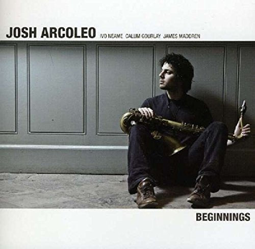CD cover: Josh Arcoleo with saxophone, against a paneled wall.