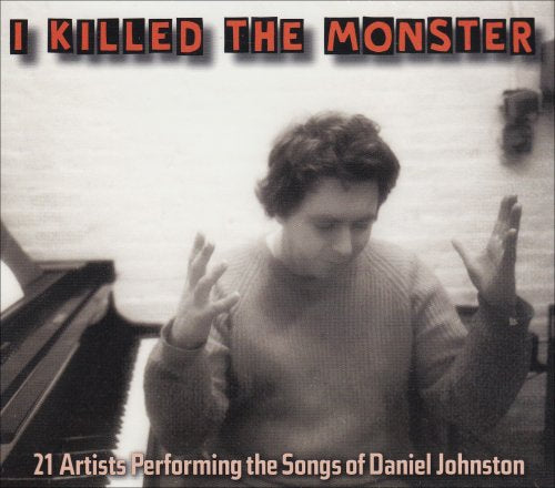 CD cover featuring a portrait of Daniel Johnston with text overlay.