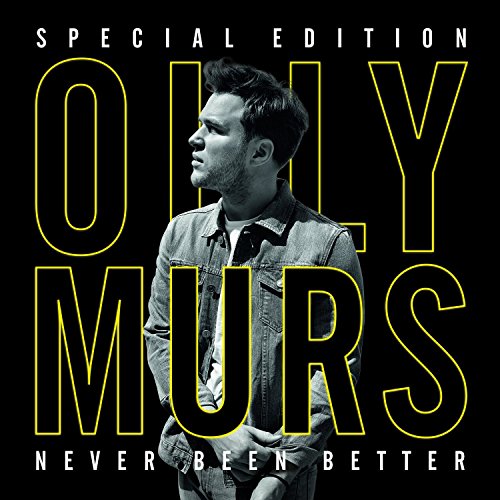 Olly Murs album cover with man in denim jacket on black background.