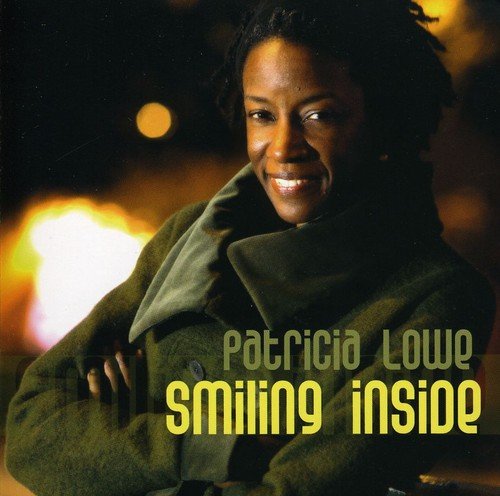 Album cover: woman smiling, arms crossed, with "Patricia Lowe Smiling Inside" text overlay.