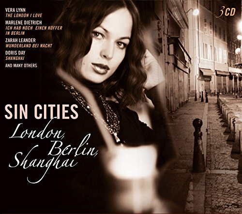 "CD cover with a woman in a dark alleyway, 'Sin Cities' title."