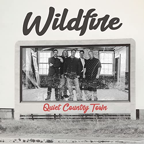 CD cover: black and white photo of a band in front of a building.
