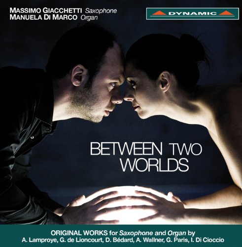 "CD cover with man and woman facing each other, illuminated hands."