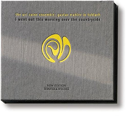"CD case with grey cover, yellow and black text, and abstract logo."