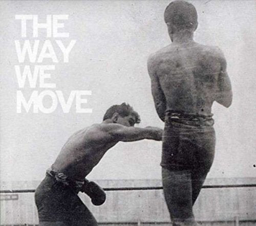"Black and white boxing album cover with two shirtless men in a ring."
