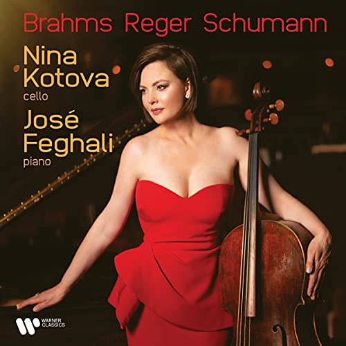 Nina Kotova, cellist, in red dress with cello and pianist José Feghali.