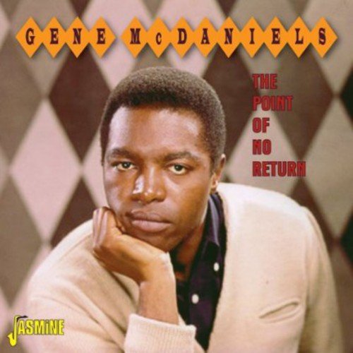 "Album cover featuring Gene McDaniels with diamond-patterned background and artist's name in diamond shapes."