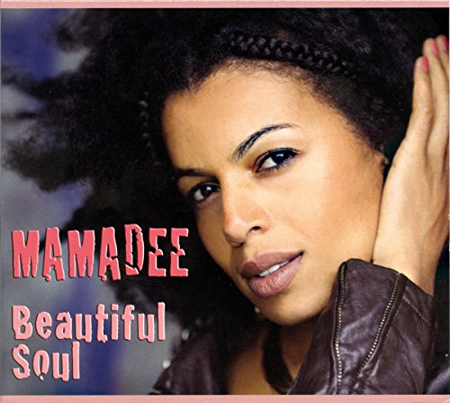 "Album cover featuring a woman with dark curly hair and brown leather jacket."